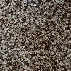 A square background of medium sized multicolored granite crumbs.