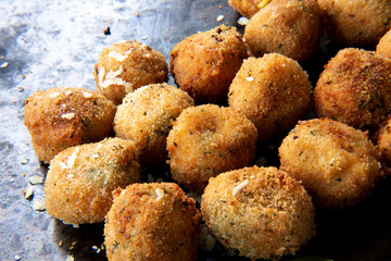 Deep Fried Tomato Sauce Risotto Balls with basil