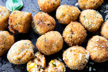 Deep Fried Tomato Sauce Risotto Balls with basil