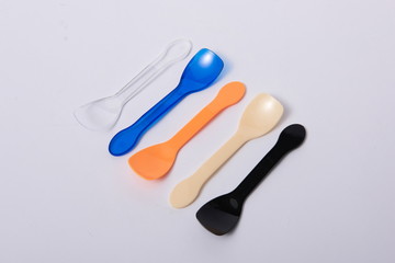 A disposable fork spoon. Quick and comfortable to use at parties. Recycle tableware. Plastic processing problems