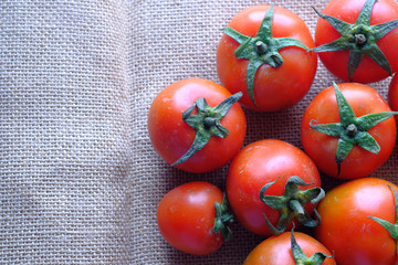 top view of fresh and ripe tomato on table 