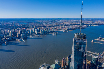 Aerial view of New York city and one world trade center brookfield place at day time