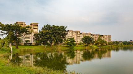 Tangerang, Indonesia - 7th June 2019: Rainbow Springs Condo Villa, a luxury apartment complex, next to a lake, in Gading Serpong residential area. It is an area with high property development.