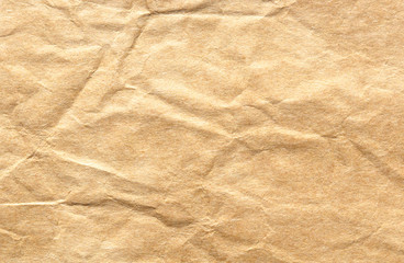 Old vintage paper with a glowing center and grunge vignette.