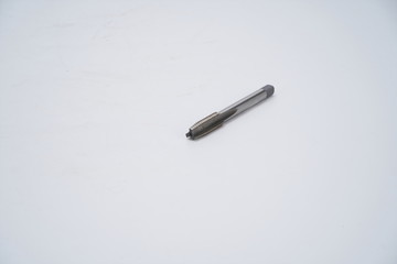 Various sizes of electric drill bit on white background,