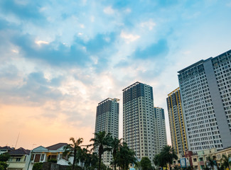 Tangerang, Indonesia - July 2019: Luxury apartments M-Town Residence in Gading Serpong, Tangerang; photographed at sunset with beautiful sky. 