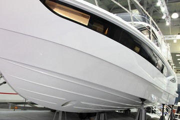 Modern powerful motor boat bottom with bow thruster steering hole and redans