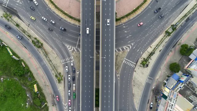 Time lapse aerial view above of circus road traffic cars in bangkok thailand.