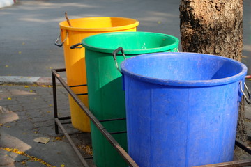 Fototapeta premium Plastic bins are placed in the park so people can use the service, discard unused things and protect the environment.