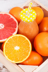 Freshly blended orange coctail from fruits. Diet and healthy nutrition concept