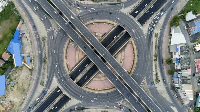 aerial top view traffic on circle road in city at day,  Rotational view, Traffic in Bangkok thailand.