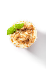 Dessert with Mango, Vanilla Cream and Cookie Crumbs Isolated