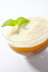 Vanilla Mousse Dessert with Chocolate and Mango Isolated