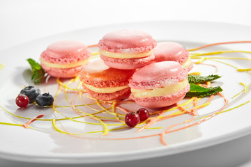 Macarons in white plate