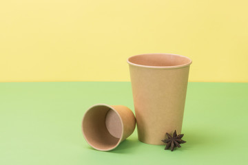 Kitchenware environmental and star anise on yellow, green backgr