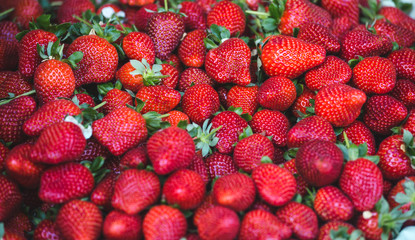 Ripe juicy strawberries on the counter of the Turkish market.