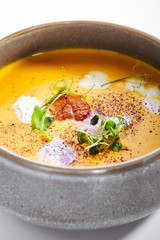 Pumpkin soup in bowl