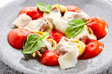 Ravioli with crab meat and tomato mousse close up