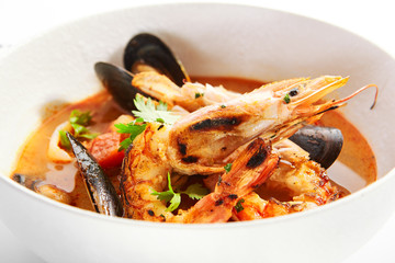 Tom Yum with seafood in bowl