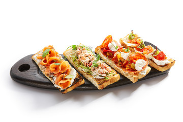 Bruschettas with seafood and vegetables