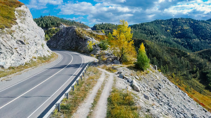 Winding mountain road. Mountain pass. Landscape aerial view of a drone. Altai.