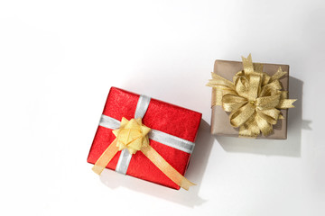 Top view of gift box with ribbon isolated on white background