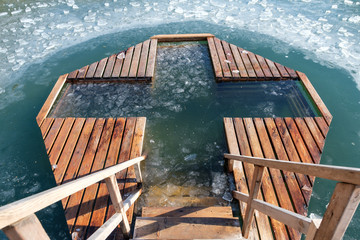 Holidays of Orthodox baptism. Ice cross hole in Russia