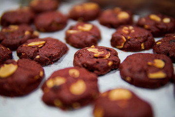 Red velvet cookies on a tray at selective focus