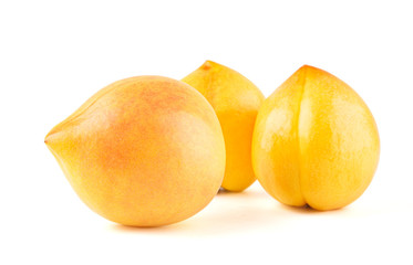 Fresh yellow peach isolated on white background.