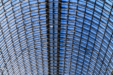 Glass roof of an old shopping center. The design of the glass roof. Abstract texture background.