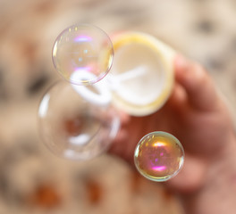 Soap bubble flies in the house.