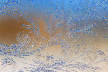 Fototapeta na wymiar Natural pattern on glass at dawn of the sun.