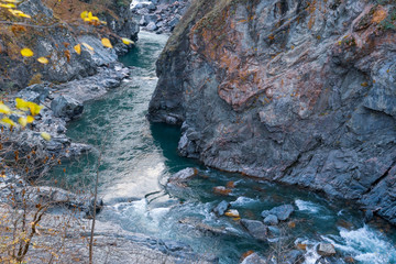 Clean mountain river in the autumn forest.