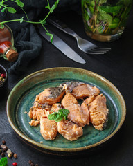 canned salmon, fish preserves (seafood in a tin can) menu concept background. top view. copy space for text