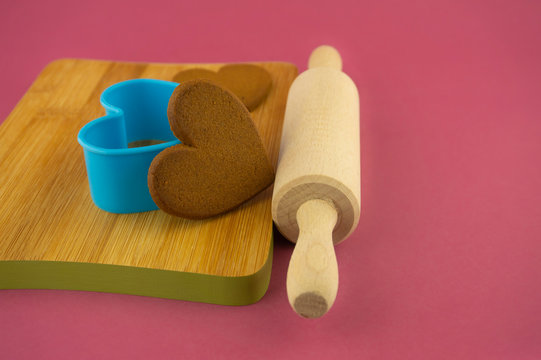 Preparing heart-shaped cookies for love