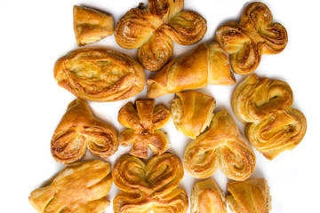 buns and croissants on a white background. top view, flat lay, background with blank space for text