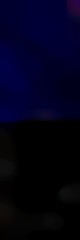 Obraz premium soft blurred vertical format background with black, very dark blue and very dark pink colors and space for text