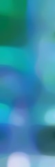 Fototapeta premium unfocused bokeh vertical format background with steel blue, teal green and light steel blue colors space for text or image