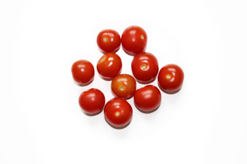 Little cherry tomatoes isolated on a white background.