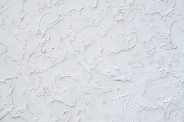 New white painted plaster om wall