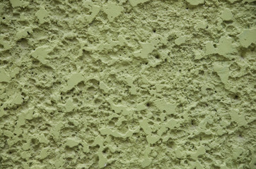New green painted plaster om wall