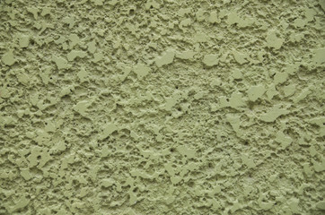 New green painted plaster om wall