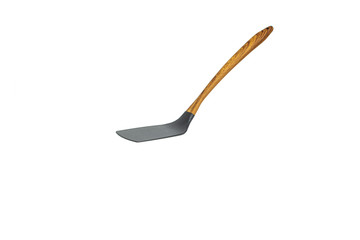 Kitchen spatula made of heat-resistant plastic with a wooden handle. Isolated on a white background.