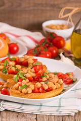 Friselle with tomatoes and chickpeas.