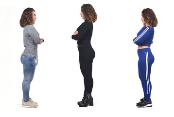 the same woman with casual elegant clothes and sportswear, arms crossed