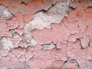Background with peeling paint in red colors