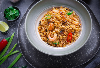 Asian Cuisine,  Fried rice, Nasi goreng, Seafood rice on dark background