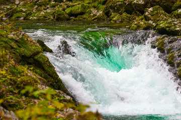 The cold azure waters of the mountain river