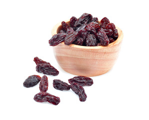 Dried raisins on a white background