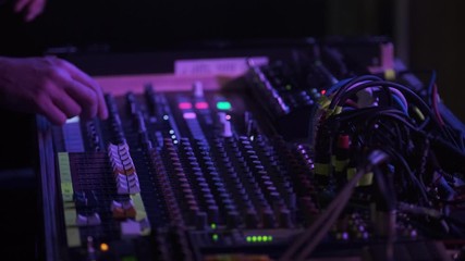 DJs Moving The Faders On The Sound Board In A Dance Party In Toronto, Ontario, Canada - Closeup Shot - Powered by Adobe